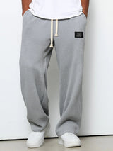 Men's Waffle-Textured Full-Length Pants with Drawstring, Side Pockets, and Wide Legs for Casual Wear